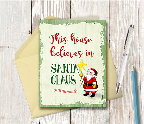 1002 This House Believes in Santa Claus Card by Deloresart